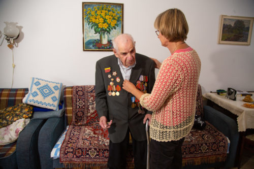 Homecare nurse Corrie speaking with a gentleman during her homecare visit