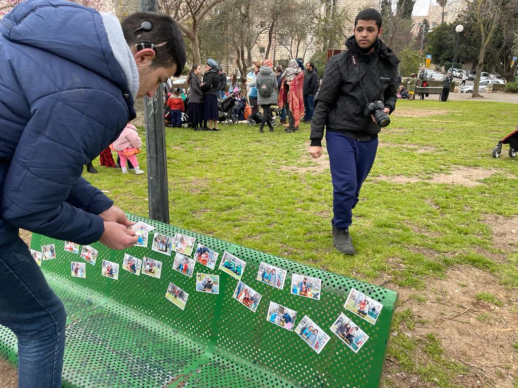 photos on magnets in Jerusalem garden